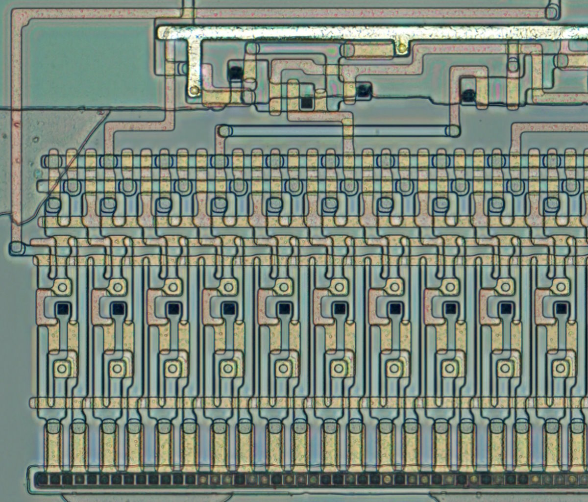 Closeup of the circuitry under the metal, showing repeated structure
